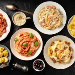Various plates of Italian pasta dishes- Crustini pizza