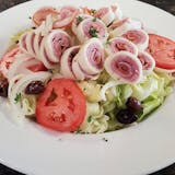 Antipasto salad on a white plate